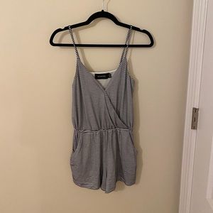 Romper with pockets and button, cross front